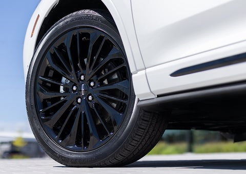 The stylish blacked-out 20-inch wheels from the available Jet Appearance Package are shown. | Loveland Lincoln in Loveland CO