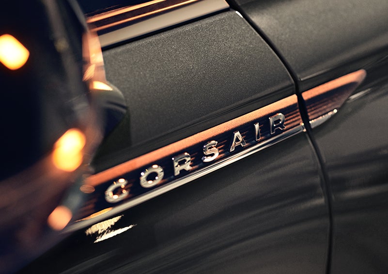 The stylish chrome badge reading “CORSAIR” is shown on the exterior of the vehicle. | Loveland Lincoln in Loveland CO