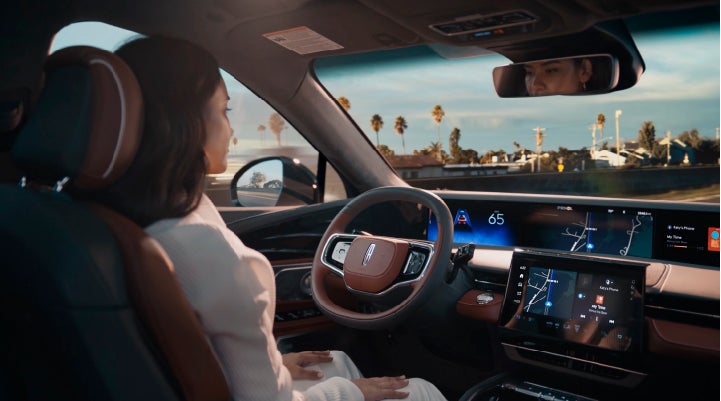A person is shown driving hands-free on the highway with available Lincoln BlueCruise technology. | Loveland Lincoln in Loveland CO