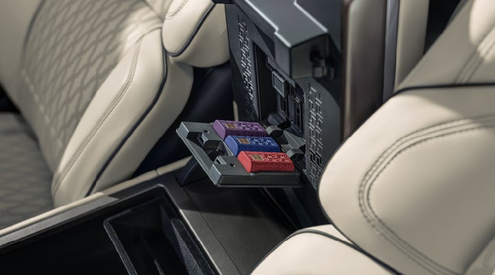 Digital Scent cartridges are shown in the diffuser located in the center arm rest. | Loveland Lincoln in Loveland CO