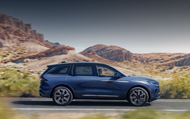 A 2024 Lincoln Nautilus® SUV is being driven in a desert setting. | Loveland Lincoln in Loveland CO