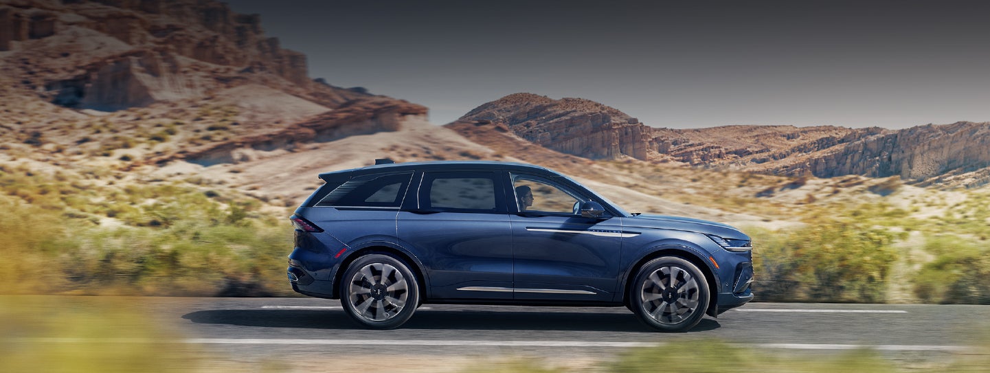 A 2024 Lincoln Nautilus® SUV is being driven in a desert setting. | Loveland Lincoln in Loveland CO