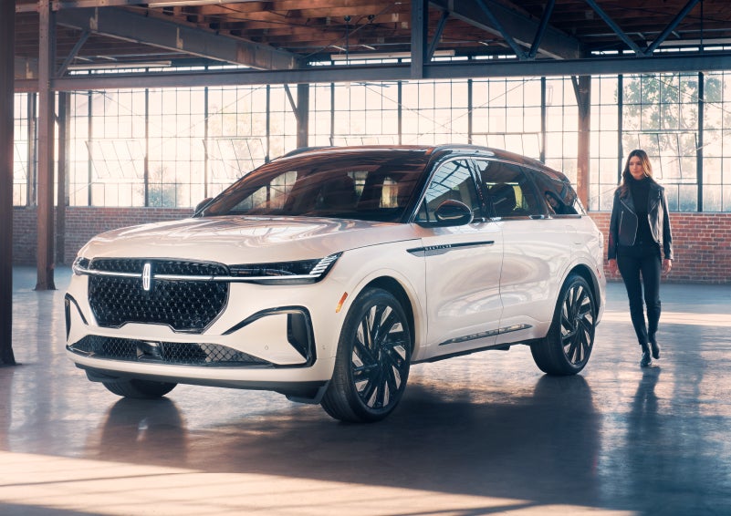 A person approaches a 2024 Lincoln Nautilus® SUV. | Loveland Lincoln in Loveland CO