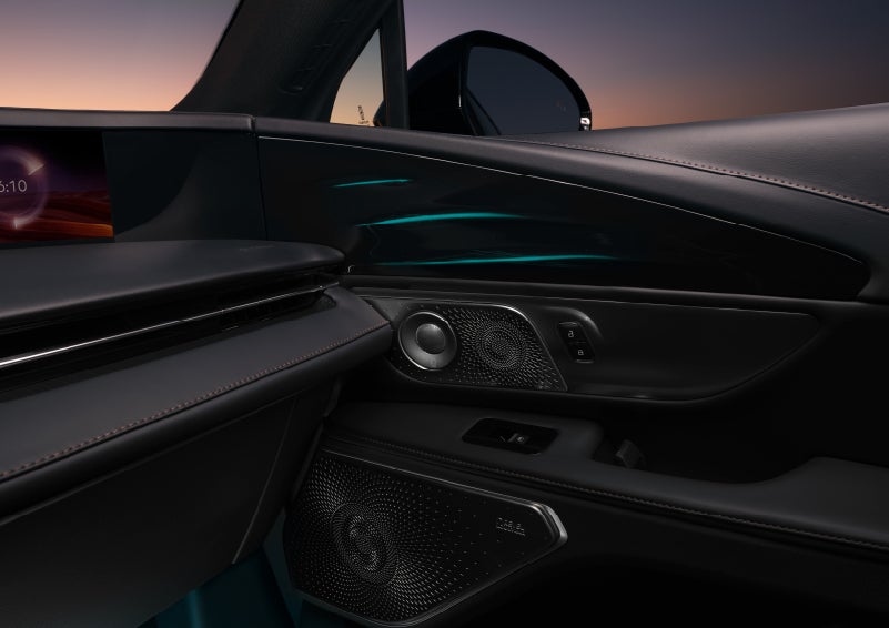 Selectable ambient lighting glows in the passenger door panel. | Loveland Lincoln in Loveland CO