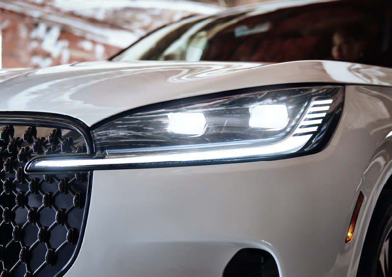 A close-up of a headlamp on the 2025 Lincoln Aviator® SUV is shown. | Loveland Lincoln in Loveland CO