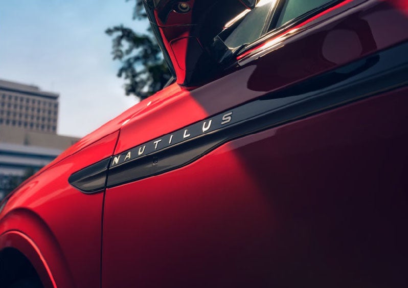 A side badge on the passenger door reads Nautilus. | Loveland Lincoln in Loveland CO