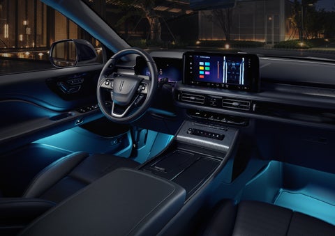 Deep blue Ambient Lighting glows from various places within a 2026 Lincoln Aviator® SUV. | Loveland Lincoln in Loveland CO