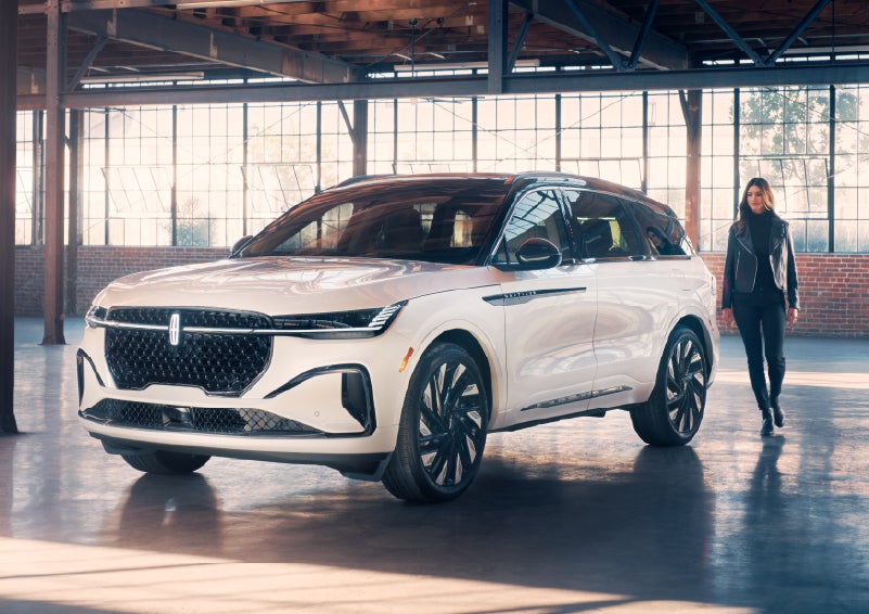 A person approaches a 2026 Lincoln Nautilus® SUV. | Loveland Lincoln in Loveland CO